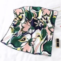 Close-up of pink and green floral silk scarf with dark blue borders on white background - Fresh Pink Green Color Block Style (FX-117)