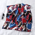Detail of red and blue abstract floral silk scarf with glossy texture and perfume accessory - Red Blue Abstract Square Scarf (FX-116)
