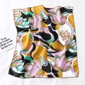 Detailed view of square silk scarf featuring abstract floral print and hand-rolled edges - Lilac Modern Floral Style (FX-115)