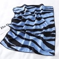 Detail of silk scarf with blue and black zebra pattern showing smooth glossy texture - Blue Black Fashion Zebra Style (FX-111)