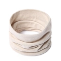 Detail of light beige knitted neck gaiter featuring soft ribbed texture and warm layers - Off-white