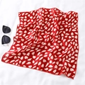 Detail of red square silk scarf with white floral print and premium hemmed edges - Red Background White Floral Style (FX-106)