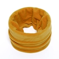 Close-up of soft bright yellow velvet neck warmer with thick plush texture and seamless loop - Turmeric