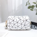 White rectangular crossbody bag with geometric triangles and branded wide woven strap - White