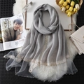 Silver grey scarf with elegant bead accents and sheer mesh trim on soft fur background - Silver Gray