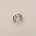 Detail view of silver ear cuff with double parallel bands and zircon-studded stars - Silver Zirconia Ear Cuff