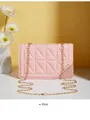 Detail of pink quilted crossbody bag with golden chain strap and magnetic lock closure - Pink
