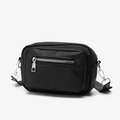 Minimalist black crossbody bag with textured fabric, silver zippers and adjustable strap - Black