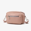 Minimalist pink PU leather crossbody bag with dual zipper compartments and adjustable strap - Pink