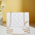 Quilted white crossbody bag with gold chain strap and magnetic geometric stitching - White