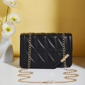 Black crossbody handbag featuring geometric quilted pattern and gold chain strap - Black
