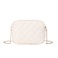 Macro detail of beige quilted PU leather camera bag with golden metal chain strap - White