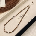 Detail of S925 silver clasp and natural tiger eye stone beads on a brown beaded necklace - Natural Tiger Eye Shell Style (B-451)