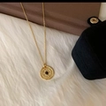 Vintage style gold coin necklace with black agate stone inlay on soft white plush background - Black Agate Disc Irregular Coin Pendant Style (B-479)