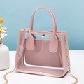 Rosa transparente PVC-Handtasche mit passender Innentasche und goldener Kette - Rosa