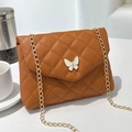 Brown quilted shoulder bag with white butterfly detail and gold chain strap for women - Brown