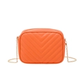 Orange V-quilted camera bag with gold chain strap, minimalist faux leather crossbody purse - Orange