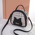 Borsa a conchiglia a quadri bianchi e neri con orecchie di gatto e manico singolo - Nero