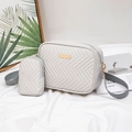Light grey quilted crossbody bag set with gold hardware and adjustable fabric strap - Gray