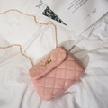 Pink quilted crossbody bag with gold chain strap and metal turn-lock closure - Pink