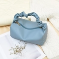 Light blue faux leather pillow bag with stylish pleated handle and cloud design - Blue