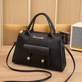 Minimalist black leather crossbody bag with golden hardware and top handles - Black