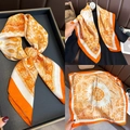 Detail of square silk scarf with orange paisley print and bohemian mandala patterns - 70x70cm / Paisley Orange