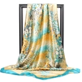 Detail of printed satin square scarf draped on black frame with floral patterns - Coral Pink Floral