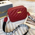 Quilted dark red camera bag with gold metal plate and wide woven shoulder strap - Red