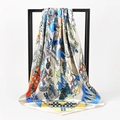 Silk-textured square scarf with blue and orange geometric floral patterns on black frame - 90x90cm / Beige
