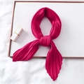 Elegant fuchsia pleated satin scarf shown tied as a decorative neckerchief for women - Rose Red