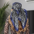 Navy blue paisley print satin square scarf styled as an elegant bohemian head wrap - New Navy Blue