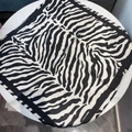 Detailed view of the black and white zebra print satin scarf on a white surface - Leopard Style 6
