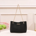 Elegant black quilted shoulder bag with V-shaped stitching and golden chain strap - Black