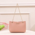 Quilted light pink crossbody bag with golden chain strap and V-pattern faux leather finish - Pink