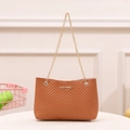 Caramel brown quilted crossbody bag with V-shaped stitching and gold chain strap - Brown