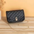 Elegant black quilted chain bag with gold twist-lock and classic diamond stitching - Black