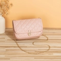 Chic light pink quilted crossbody bag with golden chain strap and oval twist lock - Pink