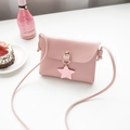Pink PU leather crossbody bag with star charm and metallic snap button closure - Pink
