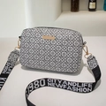 Fashionable black and white floral pattern crossbody bag with wide fabric strap - Black & White