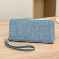 Light blue denim clutch bag with LOVE rhinestone lettering and a wrist strap - Blue
