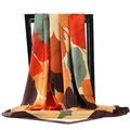 Retro leaf print satin scarf 90x90cm with dark brown borders on a black chair - Retro Red and Yellow Leaf (#3 Best Seller)