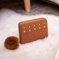 Caramel brown short PU leather wallet with diamond quilting and faux fur pompom detail - Brown