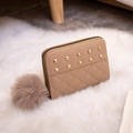 Light brown short quilted wallet with gold studs and a fluffy pom-pom charm - Khaki