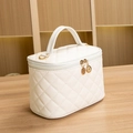 Elegant white quilted bucket makeup bag with dual gold zippers and top handle - Small / White