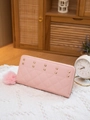 Pink quilted long wallet for women with golden studs and a fuzzy pom-pom charm - Pink