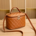 Brown quilted crossbody bucket bag with dual handles and gold-toned metal hardware - Small / Brown