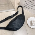 Chic black quilted waist bag for women featuring V-shaped stitching and gold zipper - Black V-Pattern