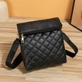 Classic black quilted crossbody bag with golden hardware and adjustable wide strap - Black
