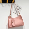 Pink faux crocodile skin shoulder bag with matching coin purse and gold hardware finish - Pink